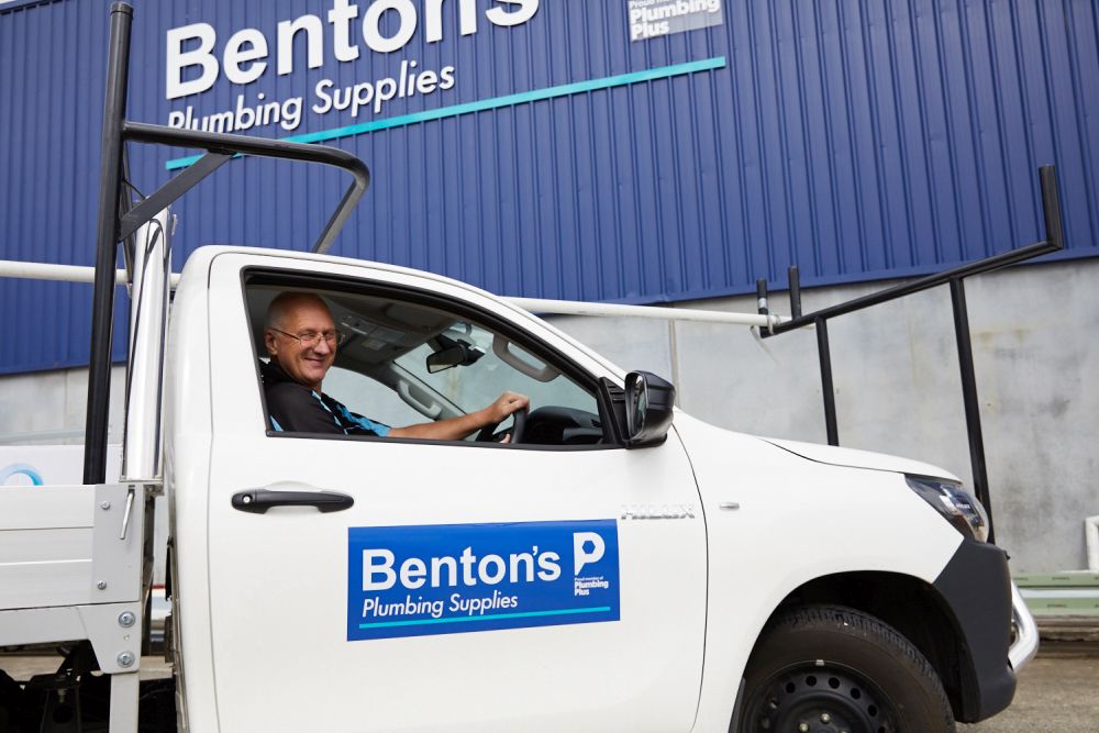 Benton's Staff Member driving a Ute